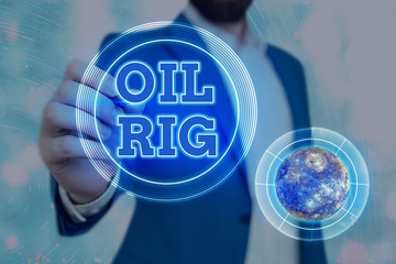 Poster - Handwriting text Oil Rig. Conceptual photo large structure with equipment to remove oil from under the seabed Elements of this image furnished by NASA