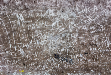 Vandal inscriptions on the wall of the ancient Forum in Rome