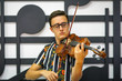 © isayurtsever - Young musician playing the violin, Close Up, Playing his handmade violin with great success
