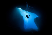 Silhouette Person Scuba Diving Undersea