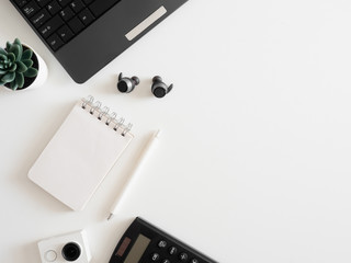 Poster - top view of work from home concept with keyboard, calculator and notebook on white background, graphic designer, Creative Designer concept.