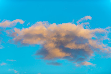 bright and juicy clouds at sunset with blue sky