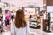 Young Asian Woman Walking In Clothes Store At The Mall, Woman Lifestyle Concept