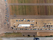 Sal`nyk, Vinnytsia, Ukraine - SEPT 02 2019: Agricultural farming event AGRO PLUS. Aerial shot of field and tractors