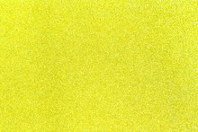 Yellow Glitter Shiny Texture Background For Christmas, Celebration Concept.