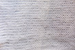 © Svetlana - background texture of a white knitted fabric