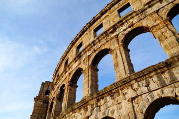 Up view of ancient stone building Roman amphitheater