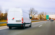 © Roman Babakin - White Minivan on road on driveway van transport reflex