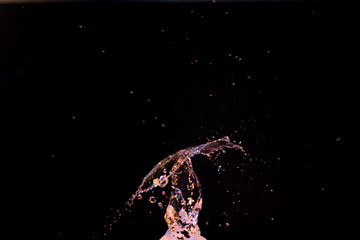 Wall Mural - High speed macro photography of a water drop splashing