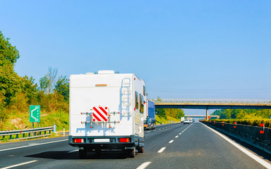 Canvas Print - RV Caravan Car on Road Camper and motorhome Italy reflex