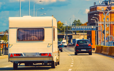 Canvas Print - Camper on road in center of Warsaw in Poland reflex