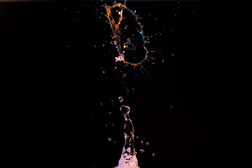 Wall Mural - High speed macro photography of a water drop splashing