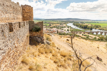 a view from the castle over the Guadiana river and the old bridge in Medellin, comarca de Vegas Altas, province of Badajoz, Extremadura, Spain