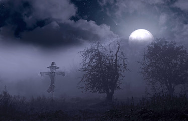 Wall Mural - Night foggy mystical garden and a scarecrow against the backdrop of the full moon