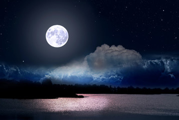 Wall Mural - full moon and cloudy sky over the night lake