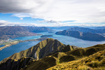 Wall Mural - Roys peak mountain hike in Wanaka New Zealand. Popular tourism travel destination. Concept for hiking travel and adventure. New Zealand landscape background.	