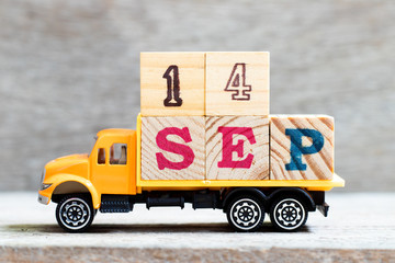 Sticker - Truck hold letter block in word 14sep on wood background (Concept for date 14 month september)