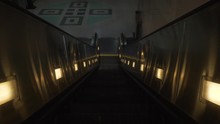 Going Down A Dark Escalator At A Subway Station