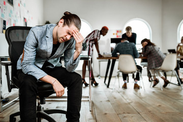 Businessman having a headache