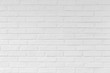 © sumroeng - Old white brick wall background