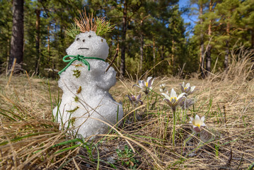 Wall Mural - snowman snowdrops flowers snow grass spring