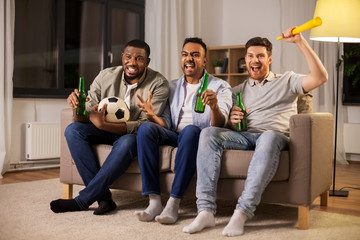 Canvas Print - friendship, sports and entertainment concept - happy male friends with soccer ball, beer and vuvuzela supporting football team at home