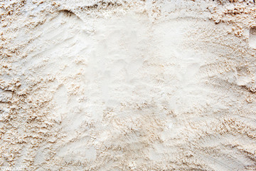 Wall Mural - Bright beige sand textured background