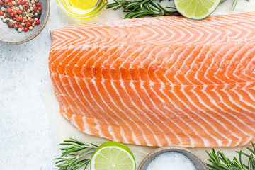 Sticker - Fresh raw salmon or trout sea fish fillet with spices and herbs on white background, top view