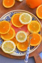 Citrus Fruit Slices On Vintage Plate