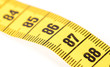 © michaklootwijk - Close-up of a yellow measuring tape isolated on white - 87