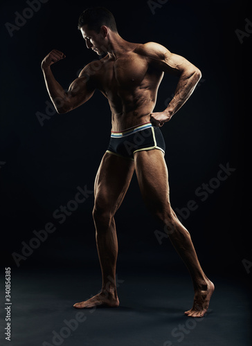 Leinwand Poster Silhouette of a strong fighter