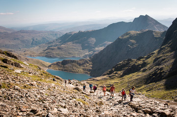 People walking up Mount Snowdon in Wales