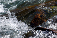 Water Mountain River And The Wonderful Rocky Creek. Water Drops After Splash. Closeup Macro View