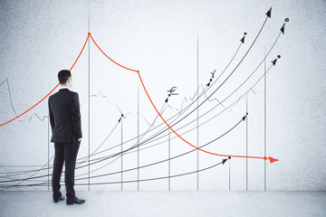 Aufkleber - Businessman looking on drawing business charts and stock analytics.
