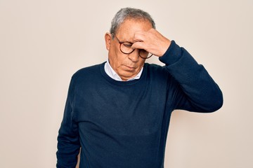 Sticker - Senior handsome grey-haired man wearing sweater and glasses over isolated white background tired rubbing nose and eyes feeling fatigue and headache. Stress and frustration concept.