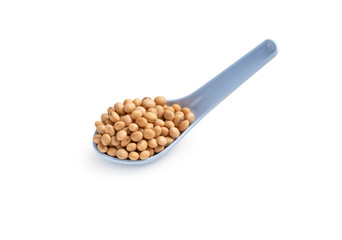 Wall Mural - Soya bean in spoon on white background