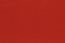 Close-up Hight Resolution Texture Of Natural Red Fabric Or Cloth In Light Red Color. Fabric Texture Of Natural Cotton Or Linen Textile Material. Red Canvas Background.