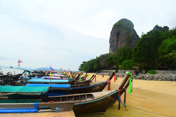 boats on the beach in thailand