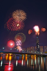 Wall Mural - Celebration. Skyline with fireworks light up sky over Landmark 81 skyscraper in Ho Chi Minh City ( Saigon ), Vietnam. Beautiful night view cityscape. Holidays, celebrating New Year and Tet holiday