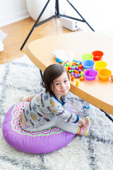 Toddler Girl Playing With Easter Toys