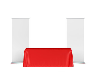 Wall Mural - Blank tradeshow tablecloth with roll-up banners aside