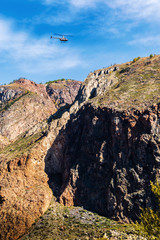 Wall Mural - Helicopter flying over a mountain valley. Chulyshman Gorge, Ulagansky District, Altai Republic, Russia