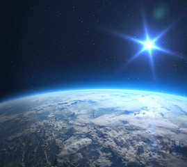 Wall Mural - earth and sun. view from outer space.