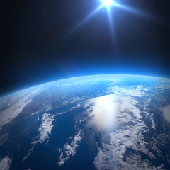 Wall Mural - earth and a spectacular sunrise.