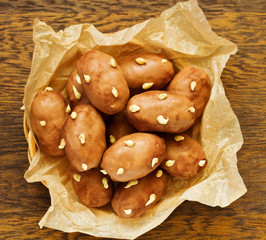 Sticker - Chocolate cake with cream in the form of potatoes.