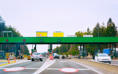 Canvas Print - Cars at Toll booth on road in Slovenia reflex