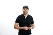 © W PRODUCTION - portrait of an handsome delivery man service driver studio shot isolated on white background