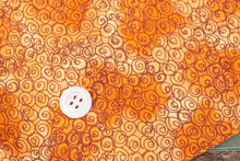 Button On Fabric