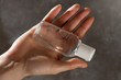 © ilyaska - Woman holding antiseptic in the open hand palm