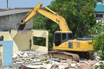 Large excavator working at construction site. Backhoe working.